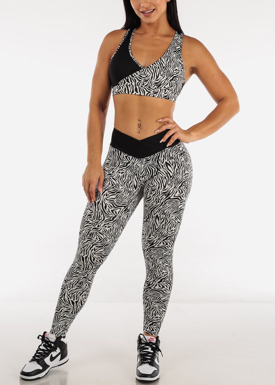 Racerback Sports Bra & Mid Rise Leggings Zebra Print (2 PCE SET) sold by Moda