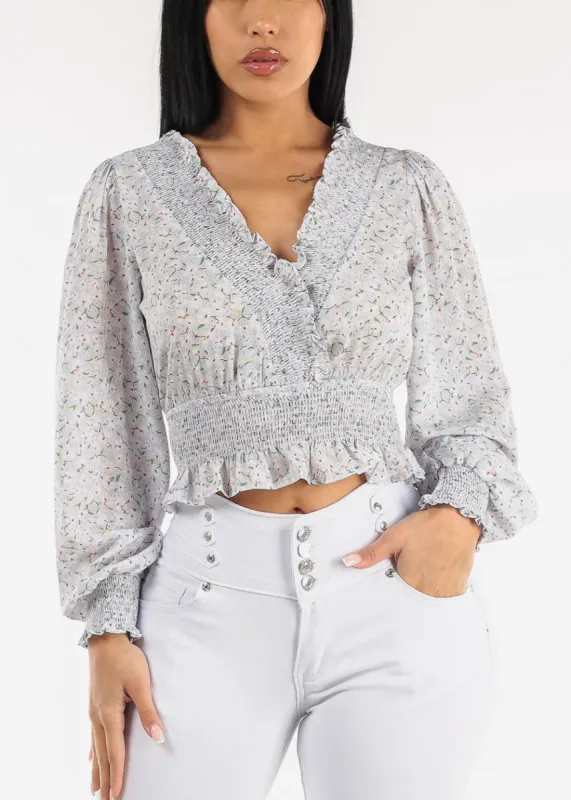 Long Sleeve Floral Surplice Smocked Top Blue sold by Moda