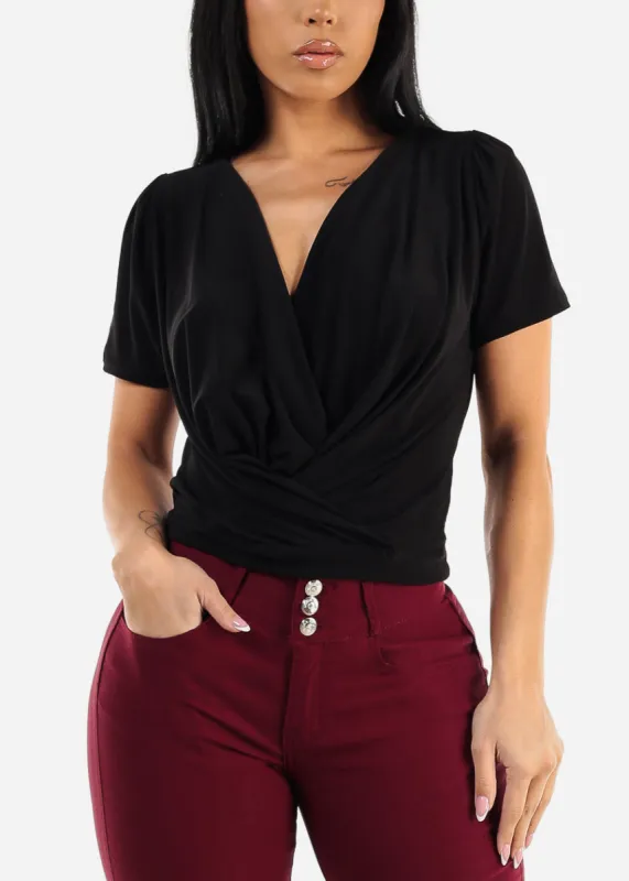 Black Short Sleeve Surplice Blouse sold by Moda
