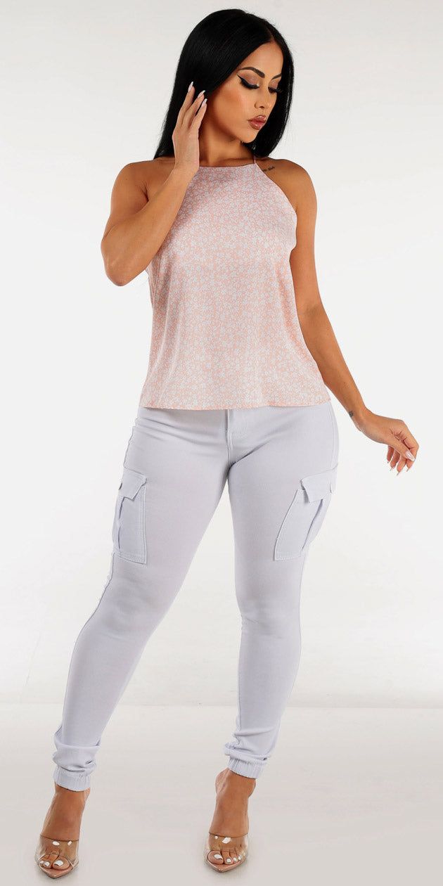 White Hyper Stretch Cargo Joggers with Sleeveless Pink Halter Floral Cami Top sold by Moda