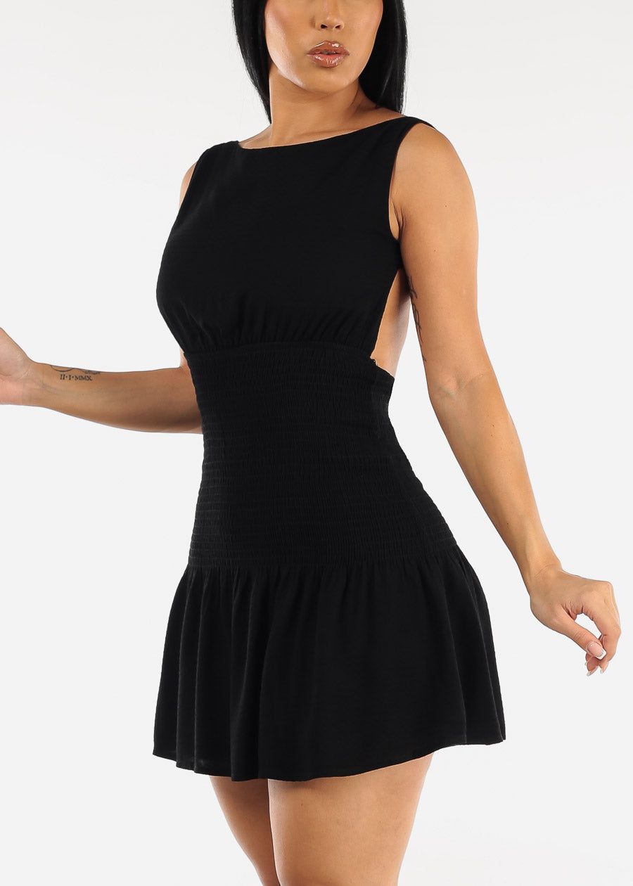 Open Back Black Smocked Mini Dress sold by Moda