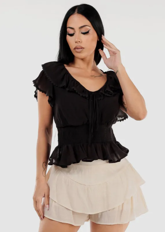 Black Short Sleeve Ruffled Top w Shirred Waist sold by Moda