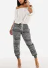 Smocked Waist Printed Jogger Pants Olive sold by Moda