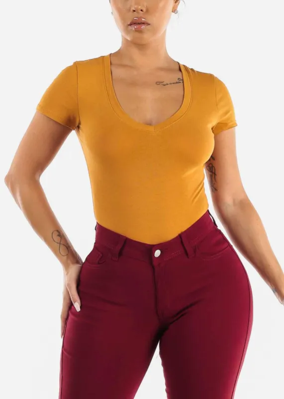 Mustard Vneck Short Sleeve Thong Bodysuit sold by Moda