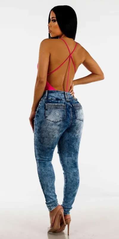 Levantacola Ripped Acid Wash Skinny Jeans with Neon Pink Open Back Sleeveless Bodysuit sold by Moda