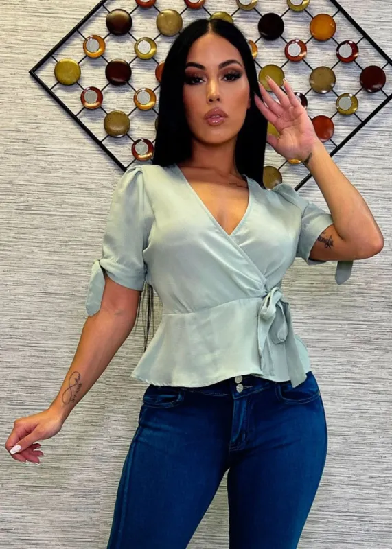 Short Sleeve Self Tie Peplum Blouse Sage sold by Moda