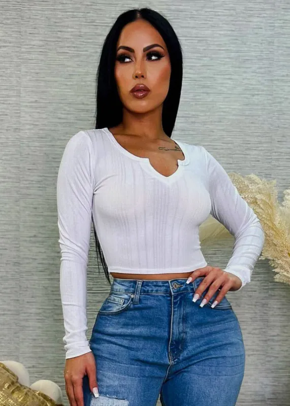 White Long Sleeve Notched Neckline Crop Top sold by Moda