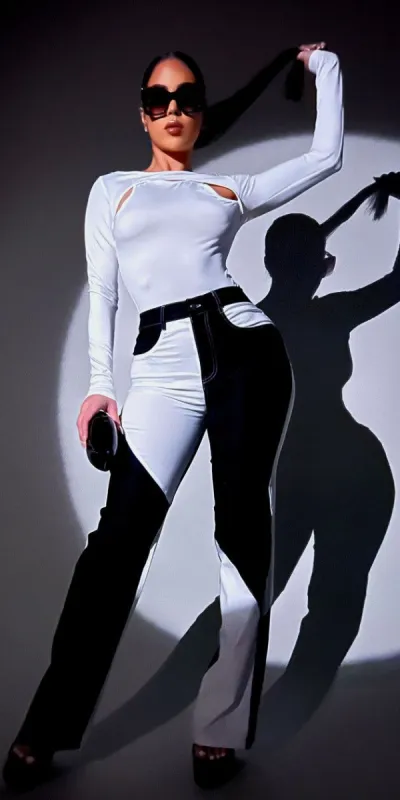 Black & White  Wide Legged Pants with White Long Sleeve Cut Out Top sold by Moda