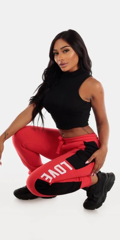 Red Fleece Jogger Sweatpants with Sleeveless Mock Neck Black Crop Top sold by Moda