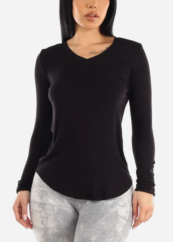 Long Sleeve Vneck Round Hem Black Jersey Top sold by Moda