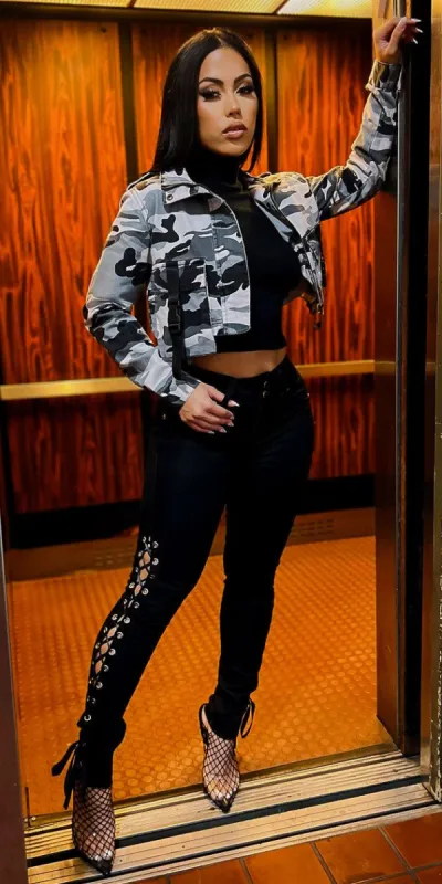 Black Butt Lifting Lace Up Sides Skinny Jeans Black Mock Neck Cropped Sweater and Camouflage Cropped Jacket sold by Moda
