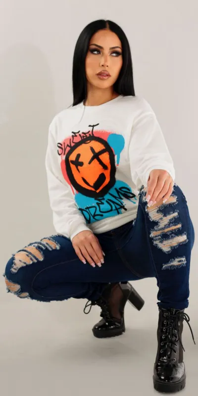 Graphic & Ripped Skinnies Outfit sold by Moda