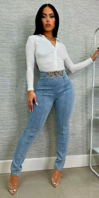 High Rise Acid Wash Denim Stretch Skinny Pants with White Long Sleeve Ruched Bodysuit sold by Moda