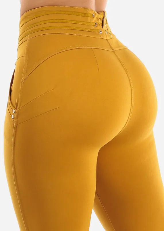 Mid Rise Butt Lifting Skinny Pants Mustard sold by Moda
