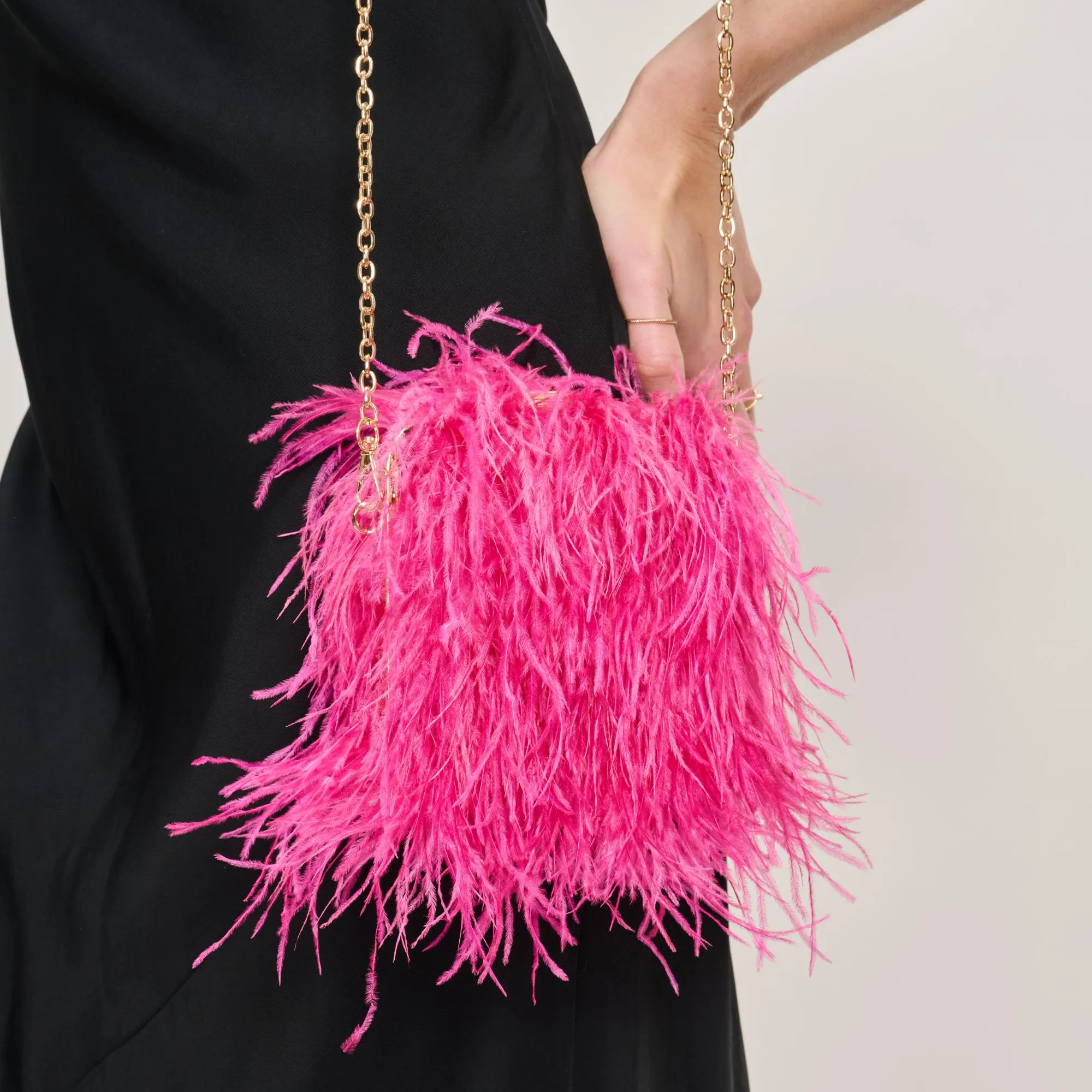 Feathered Flair Evening Bag sold by Moda Luxe