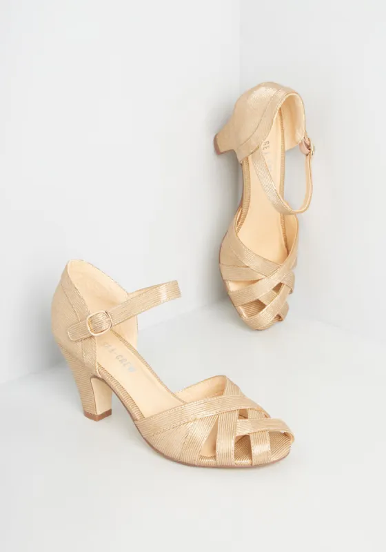 Spinning Gold Ankle Strap Heel sold by Modcloth