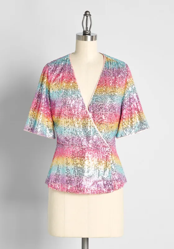 Sparkling Spectrums Surplice Peplum Top sold by Modcloth