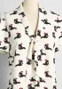 Polished and Playful Tie-Neck Blouse sold by Modcloth