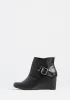 Living on the Wedge Bootie sold by Modcloth