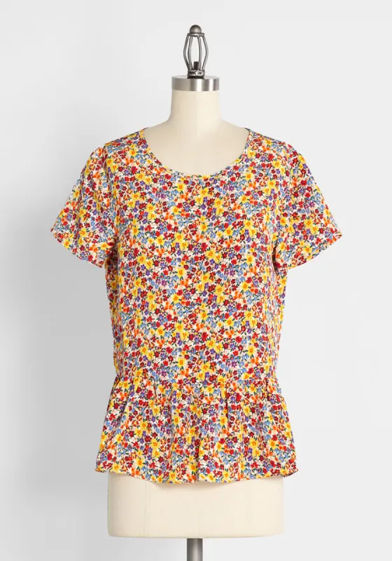 One With the Wildflowers Peplum Top sold by Modcloth