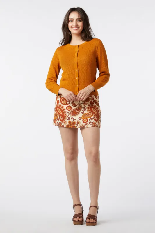 Claire Cardi sold by Modcloth