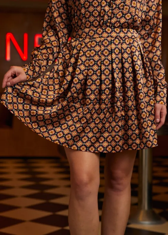 Geo Pleated Mini Skirt sold by Modcloth