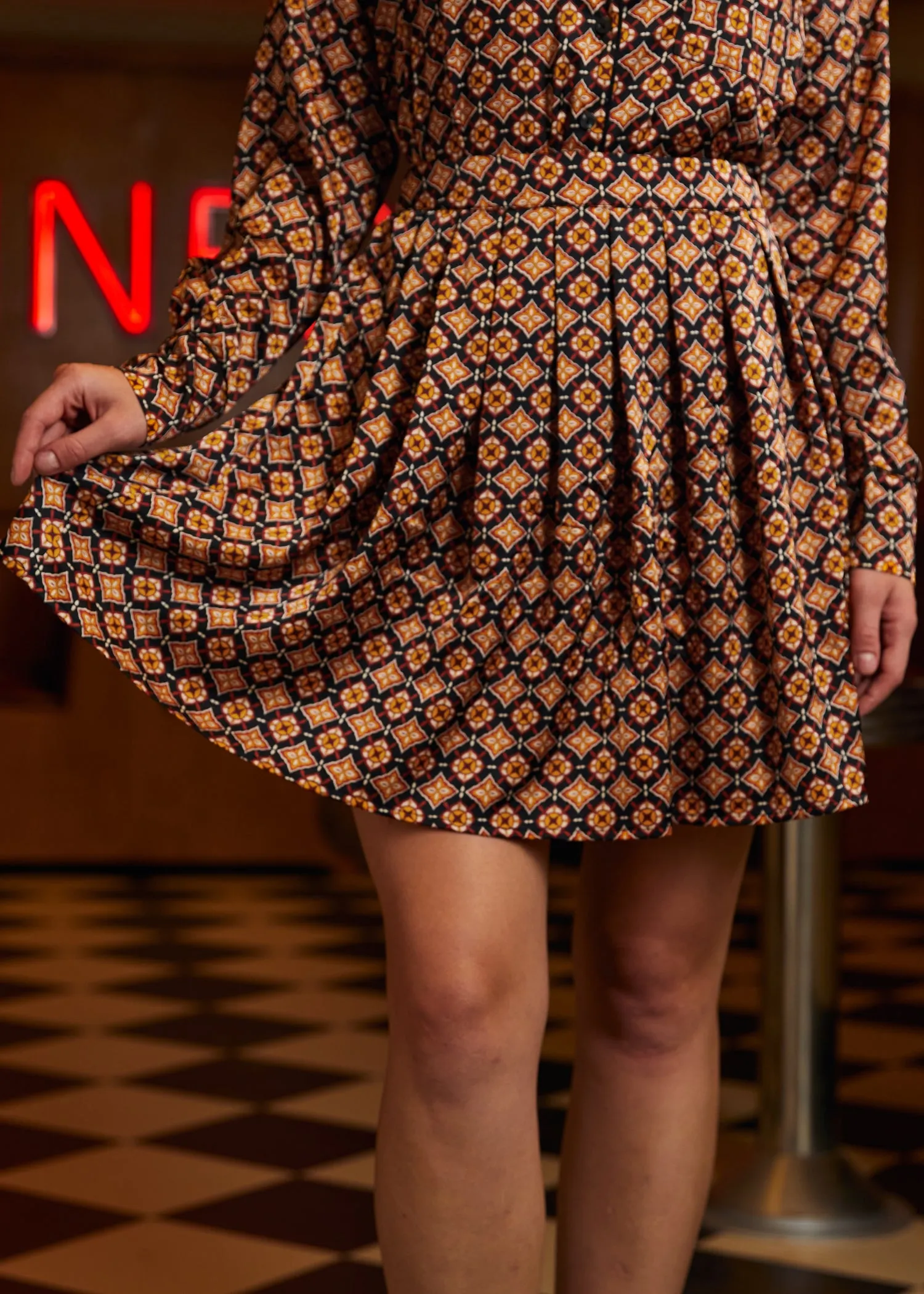 Geo Pleated Mini Skirt sold by Modcloth