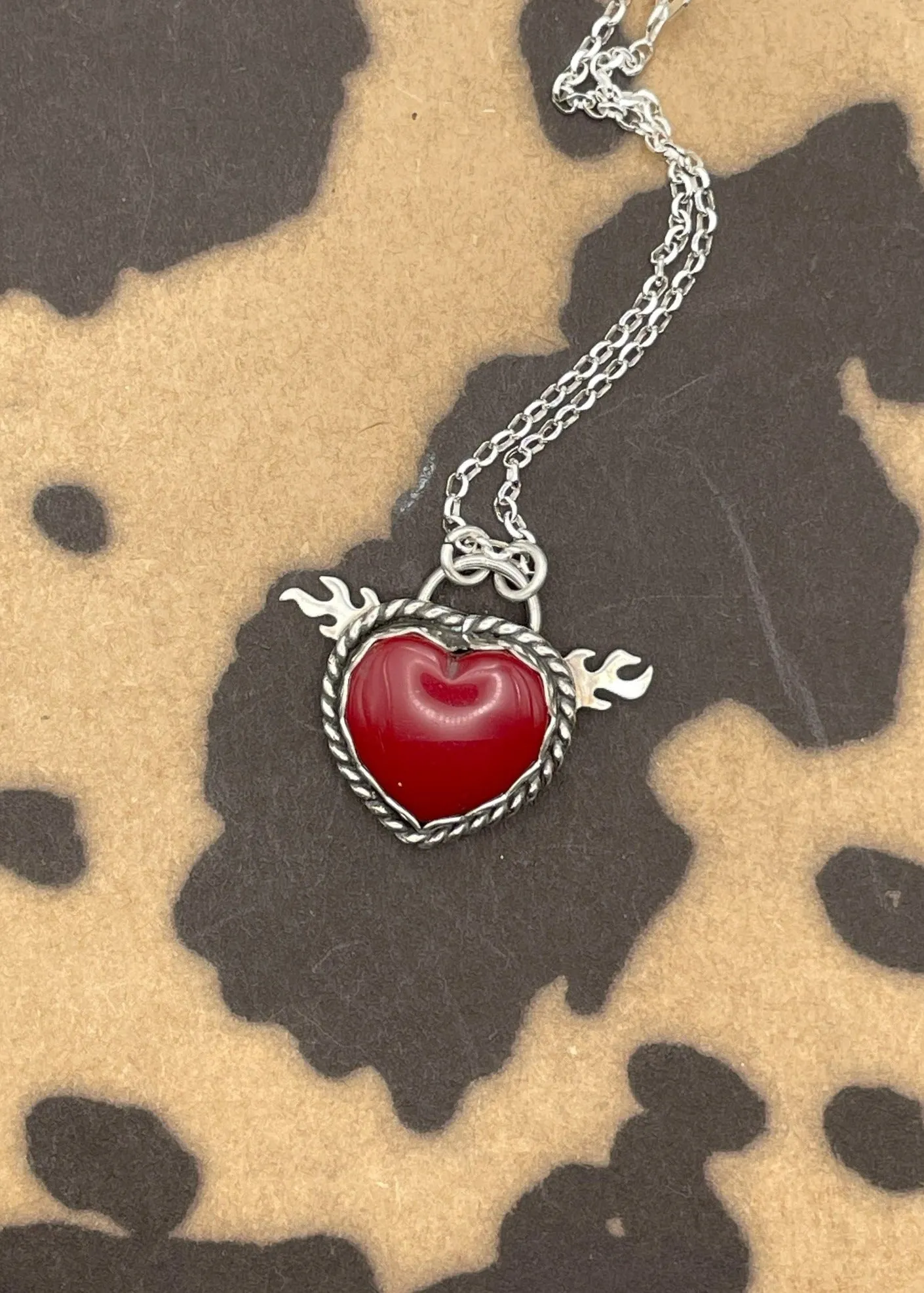 Rosarita Heart with Flame Detail Pendant sold by Modcloth