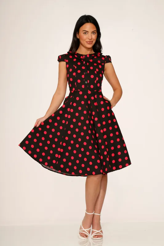 Black & Pink Polka Dot Swing Dress sold by Modcloth