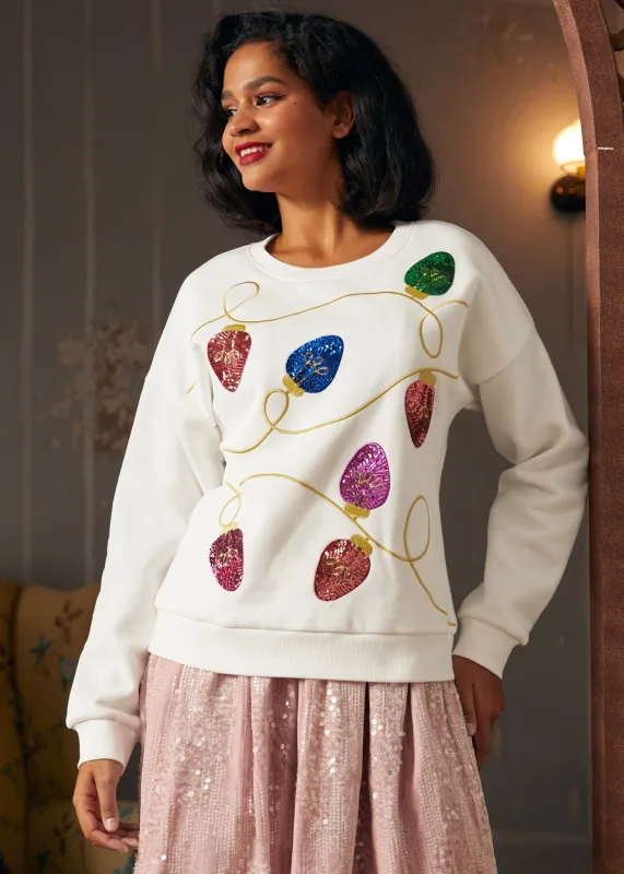 Glow of Nostalgia Light Sweatshirt sold by Modcloth