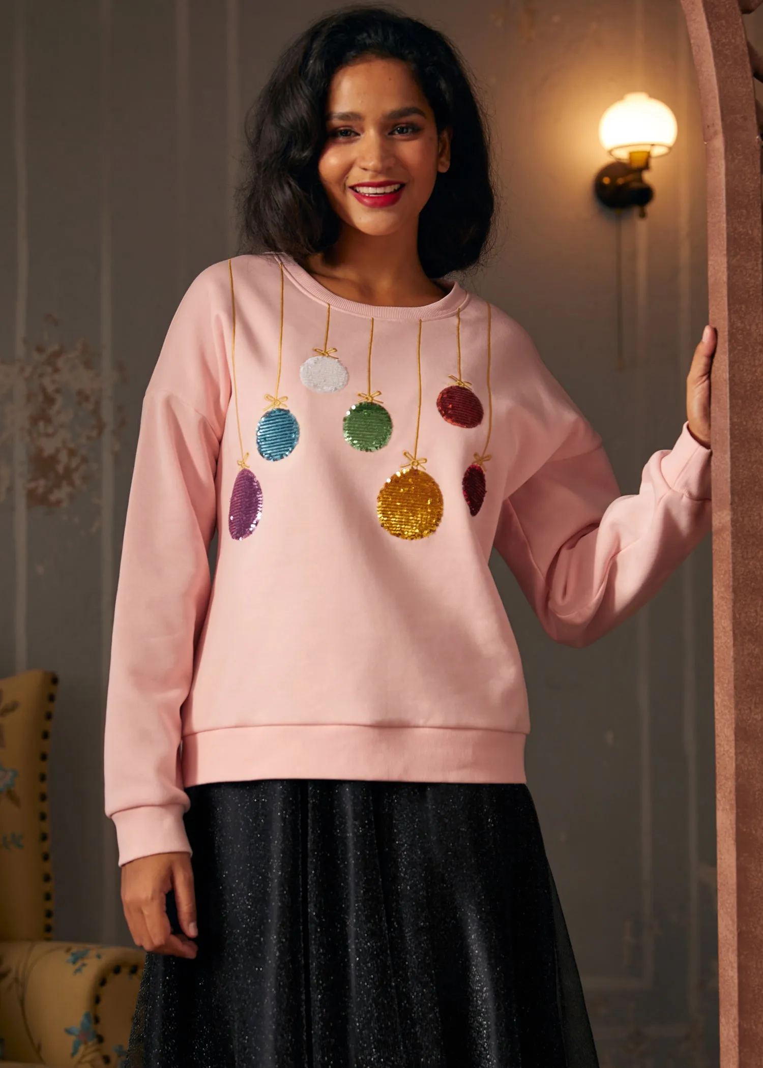 Festive Folly Ball Sweatshirt sold by Modcloth