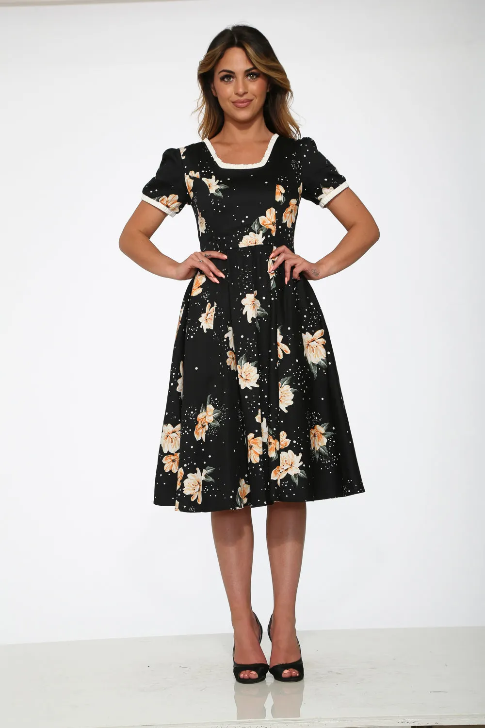 Black & Yellow Floral Swing Dress sold by Modcloth