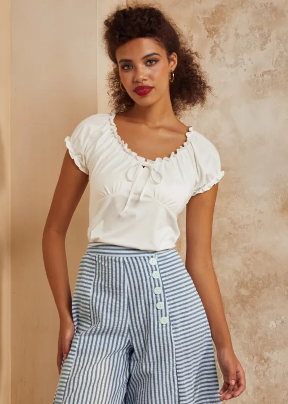 The Darling Detail Bow Tee sold by Modcloth