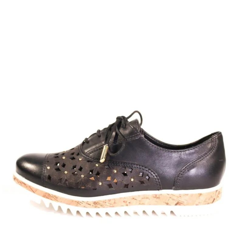 Dallas Embroidered Leather Sneakers sold by Modcloth