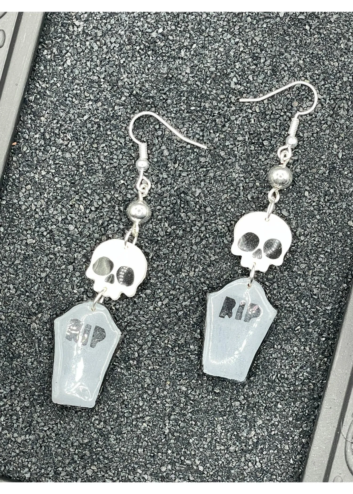 Salem RIP Coffin Skull Dangle Earrings sold by Modcloth