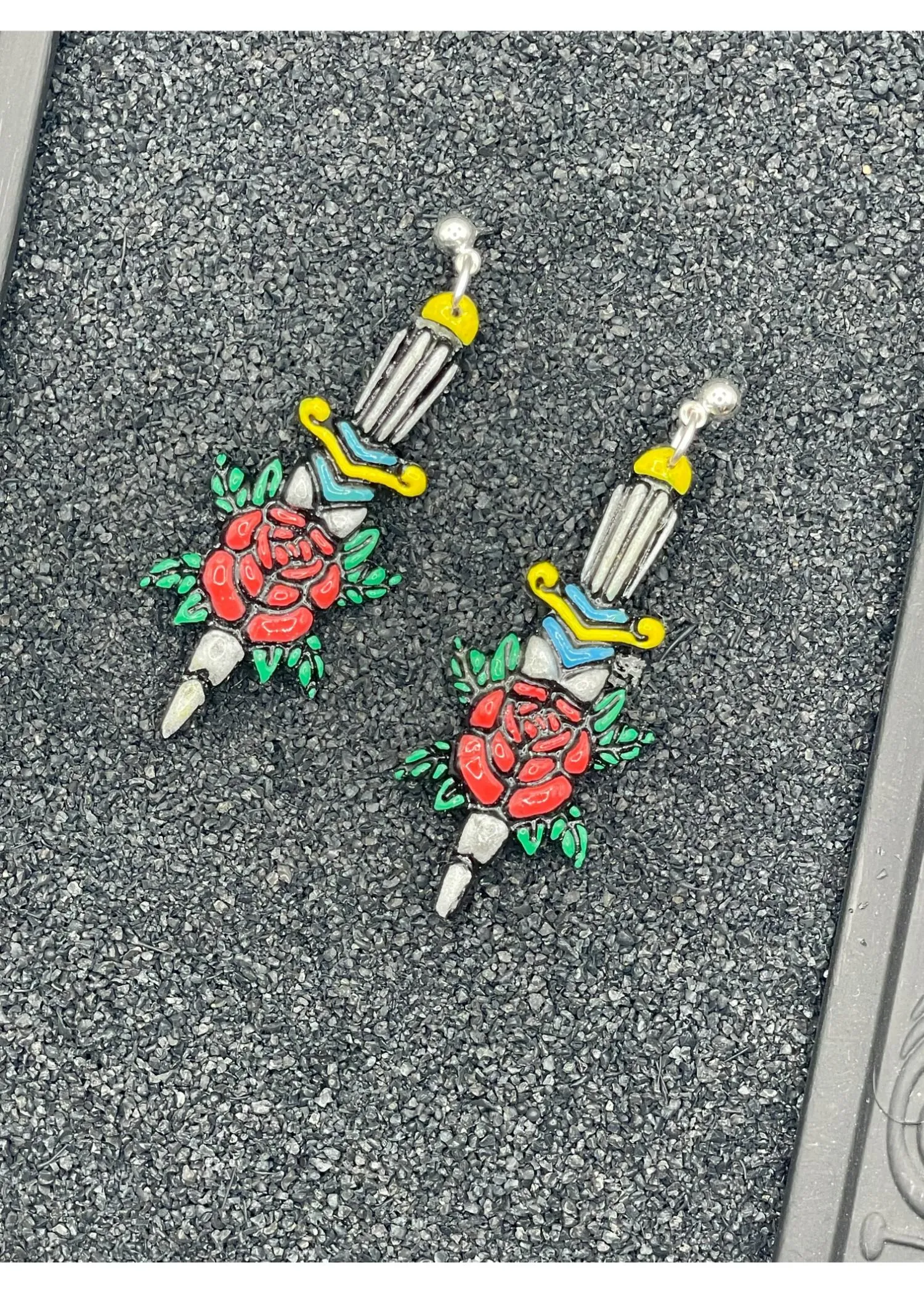 Tattoo Love Rose Dagger Earrings sold by Modcloth