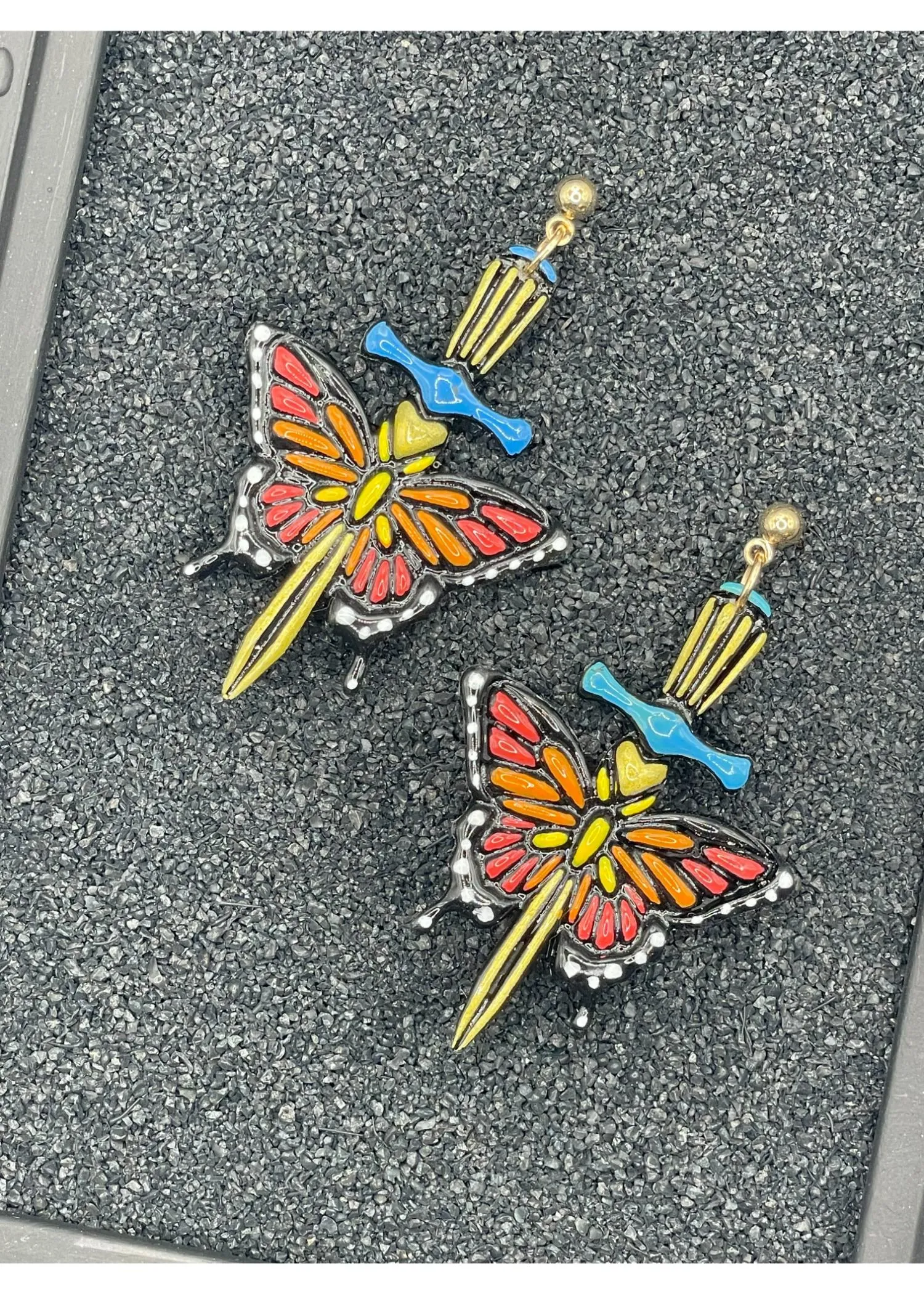 Tattoo Love Butterfly Dagger Earrings sold by Modcloth