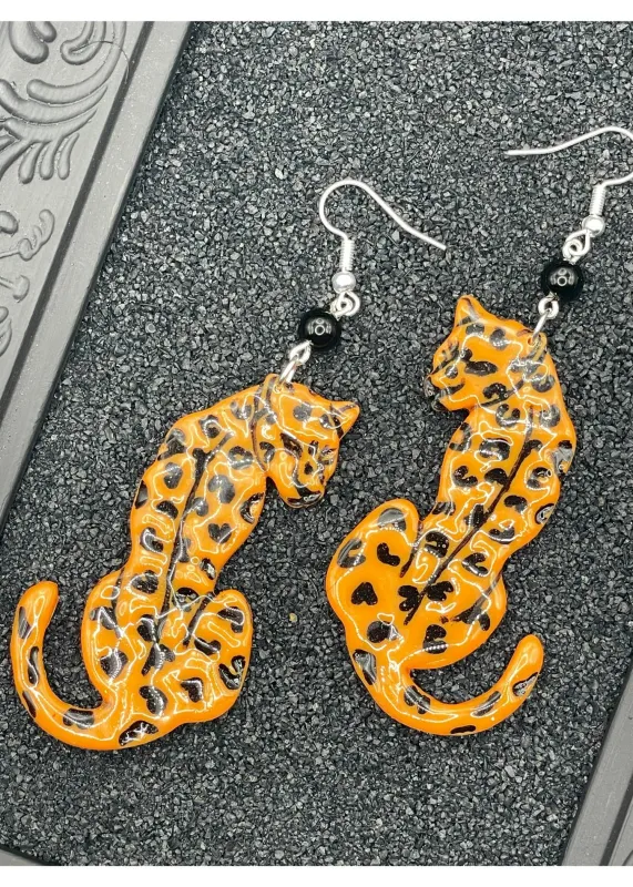 Tattoo Love Cheetah Dangly Earrings sold by Modcloth