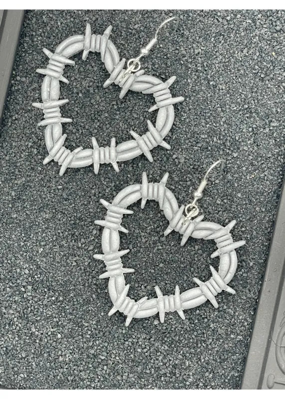 Tattoo Love Barbed Wire Heart Earrings sold by Modcloth