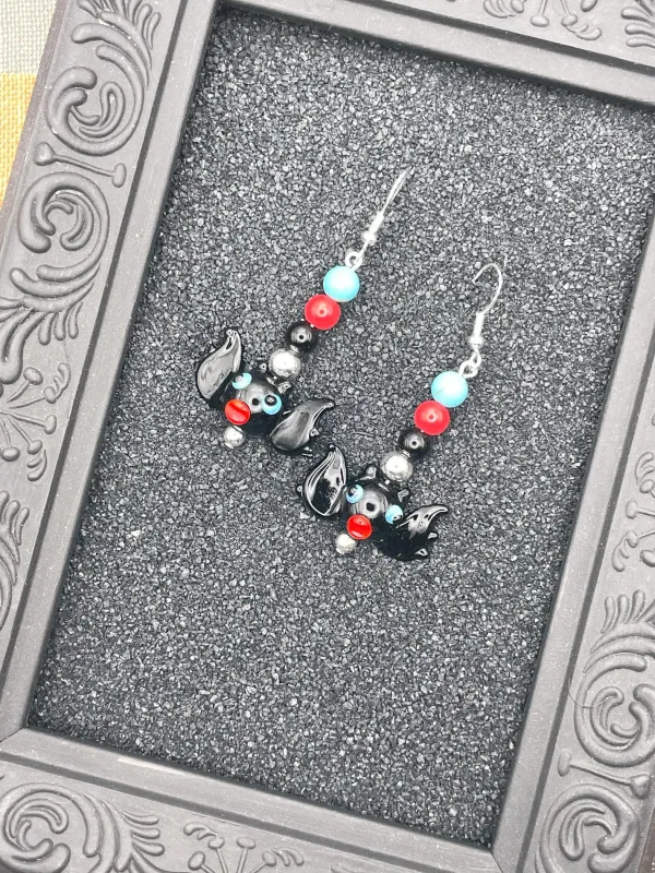 Salem Glass Bead Bat Earrings sold by Modcloth