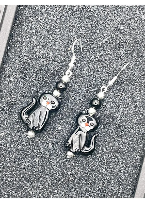 Salem Glass Bead Black Cat Earrings sold by Modcloth