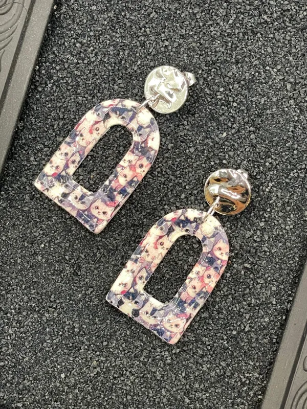 Cat Print Arched Dangle Earrings sold by Modcloth