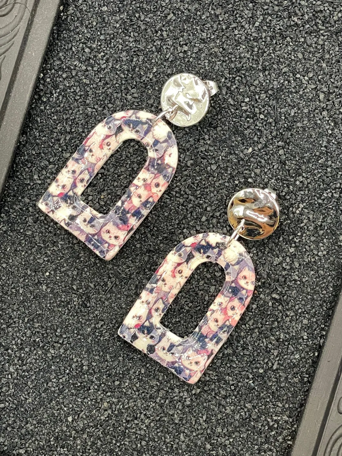 Cat Print Arched Dangle Earrings sold by Modcloth