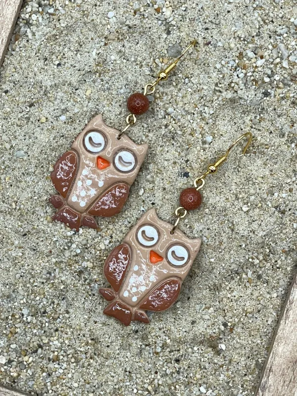 Cutie Owl Dangle Earrings sold by Modcloth