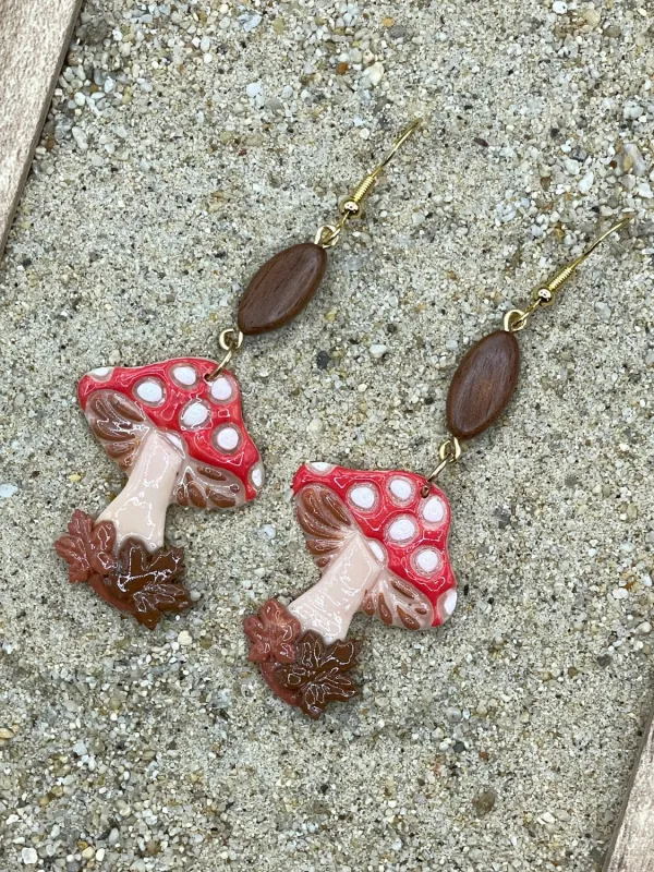 Mushrooms with Fall Leaves Earrings sold by Modcloth
