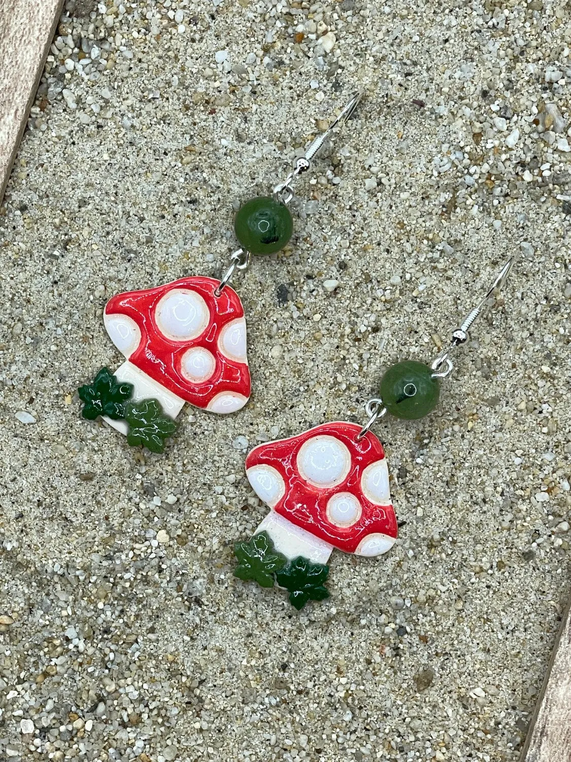 Red Polka Dot Mushroom Earrings sold by Modcloth