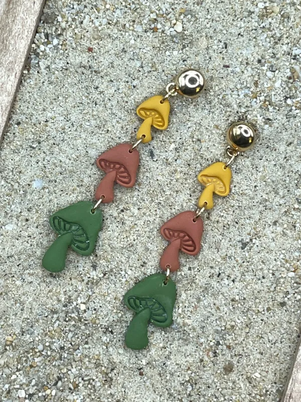 Triple Mushroom Dangle Earrings sold by Modcloth