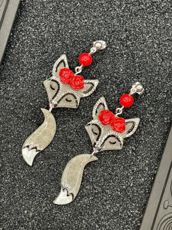 Cutie Silver Fox Dangle Earrings sold by Modcloth
