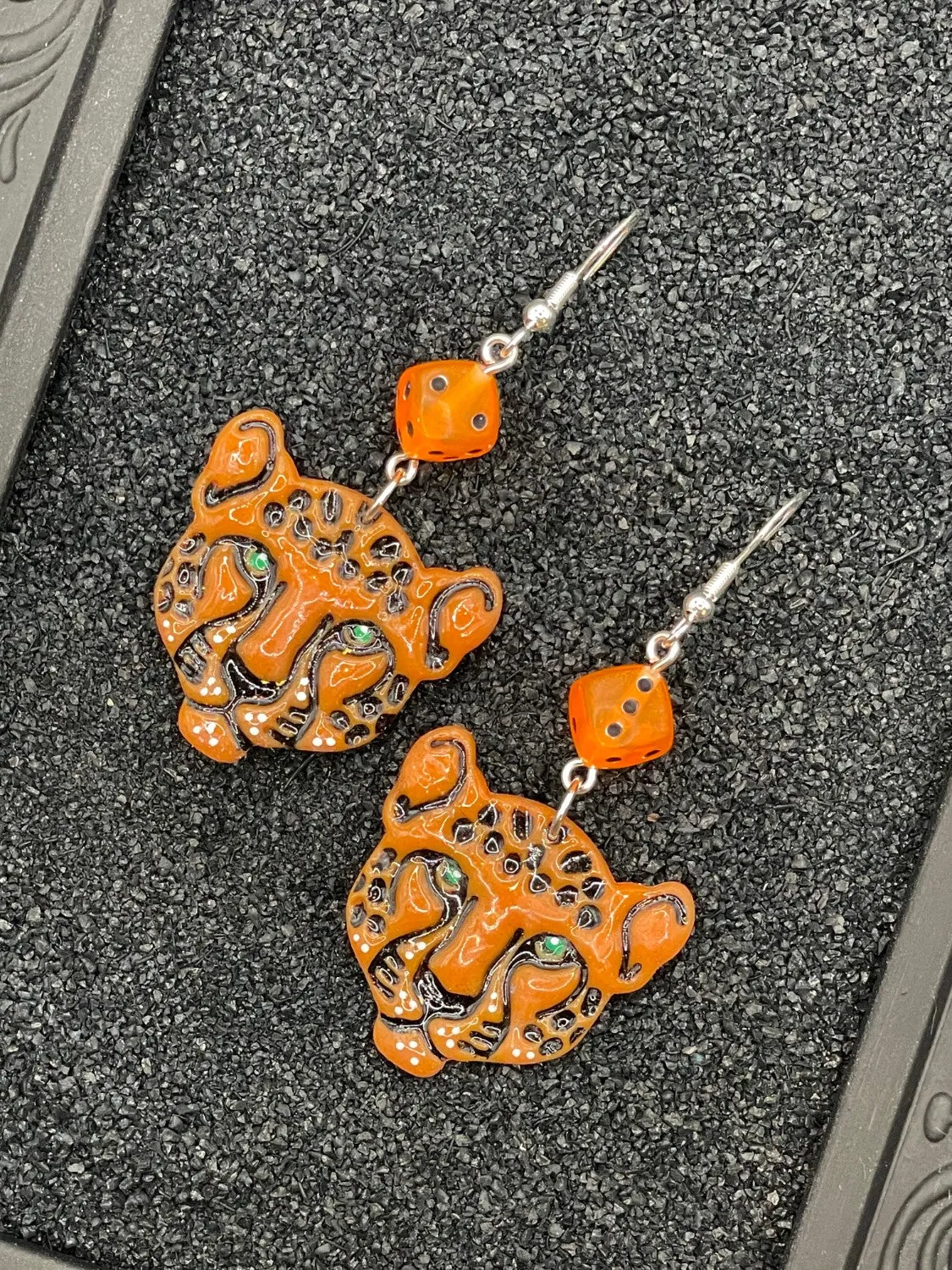Tattoo Love Cheetah Head with Dice Earrings sold by Modcloth