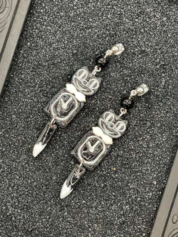 Retro Black Kitty Cat Clock Earrings sold by Modcloth